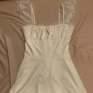 White dress with a corset in the back